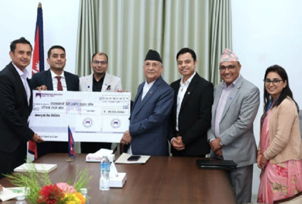 माछापुच्छ्रे बैंकद्वारा प्रधानमन्त्री दैवीप्रकोप उद्धार कोषमा २५ लाख सहयोग